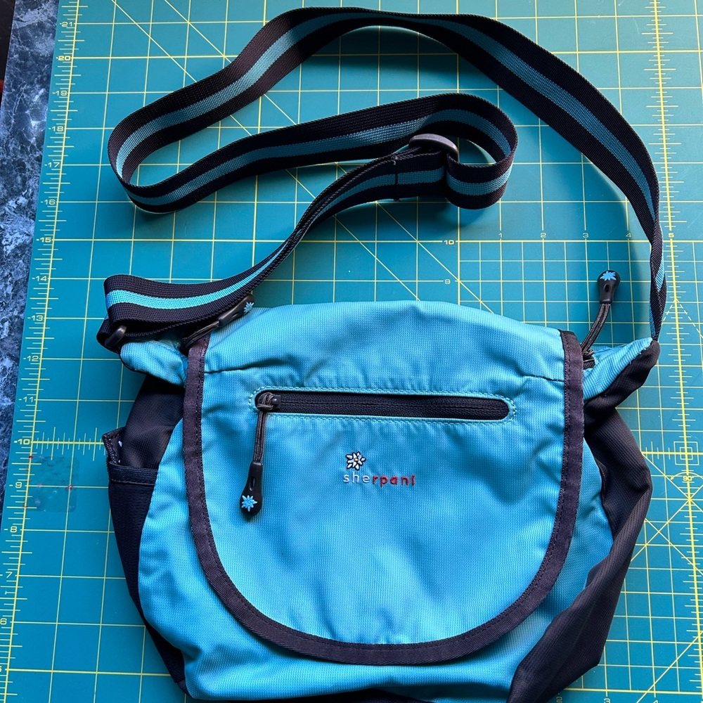 Sherpani Blue and Black Crossbody Bag